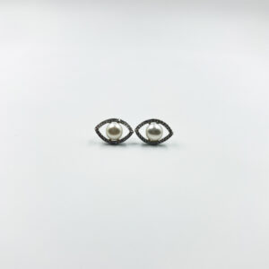An evil eye pearl studs from ekatvajewls