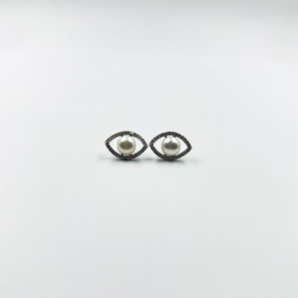 An evil eye pearl studs from ekatvajewls